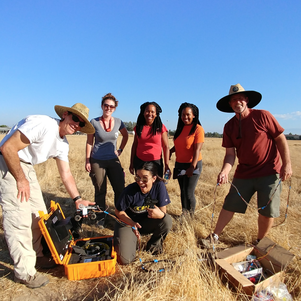 Dr. Ariel Loredo monitors conditions in burrows of endangered San Joaquin kit foxes for possible mange transmission.