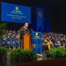 Dr. Jose Emilio Esteban at the podium of the 2024 School of Veterinary Medicine Commencement Ceremony
